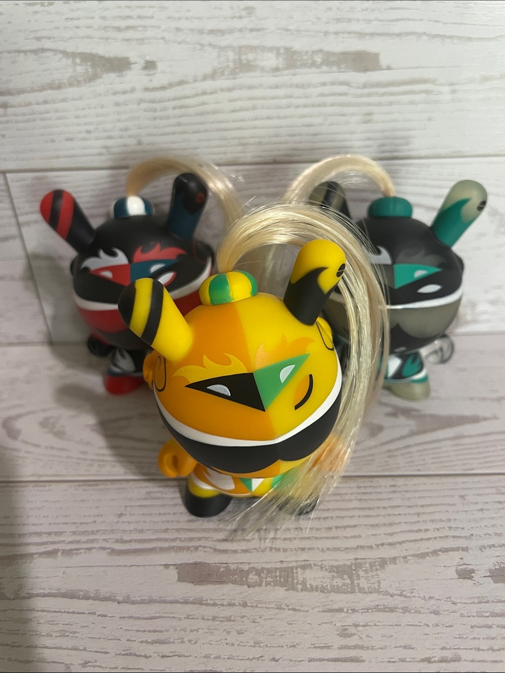 Yellow Vinyl Play Figure with Blonde Hair and Green Accent - Designer Kids Toy